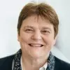 Dr. Martine George